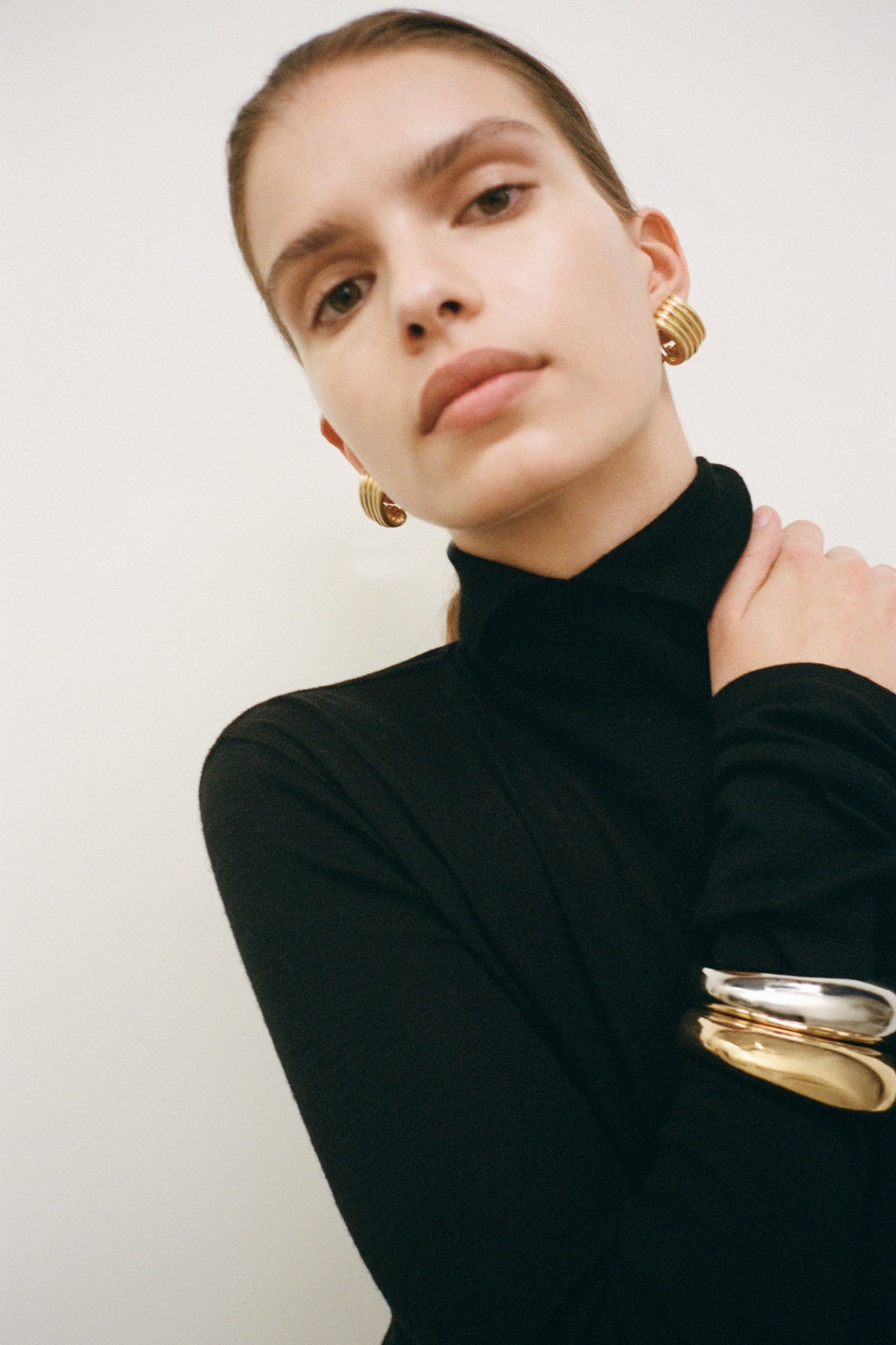 Styled image CAMILLA AND MARC Koa Cuff in sculptural 18k gold plating.  