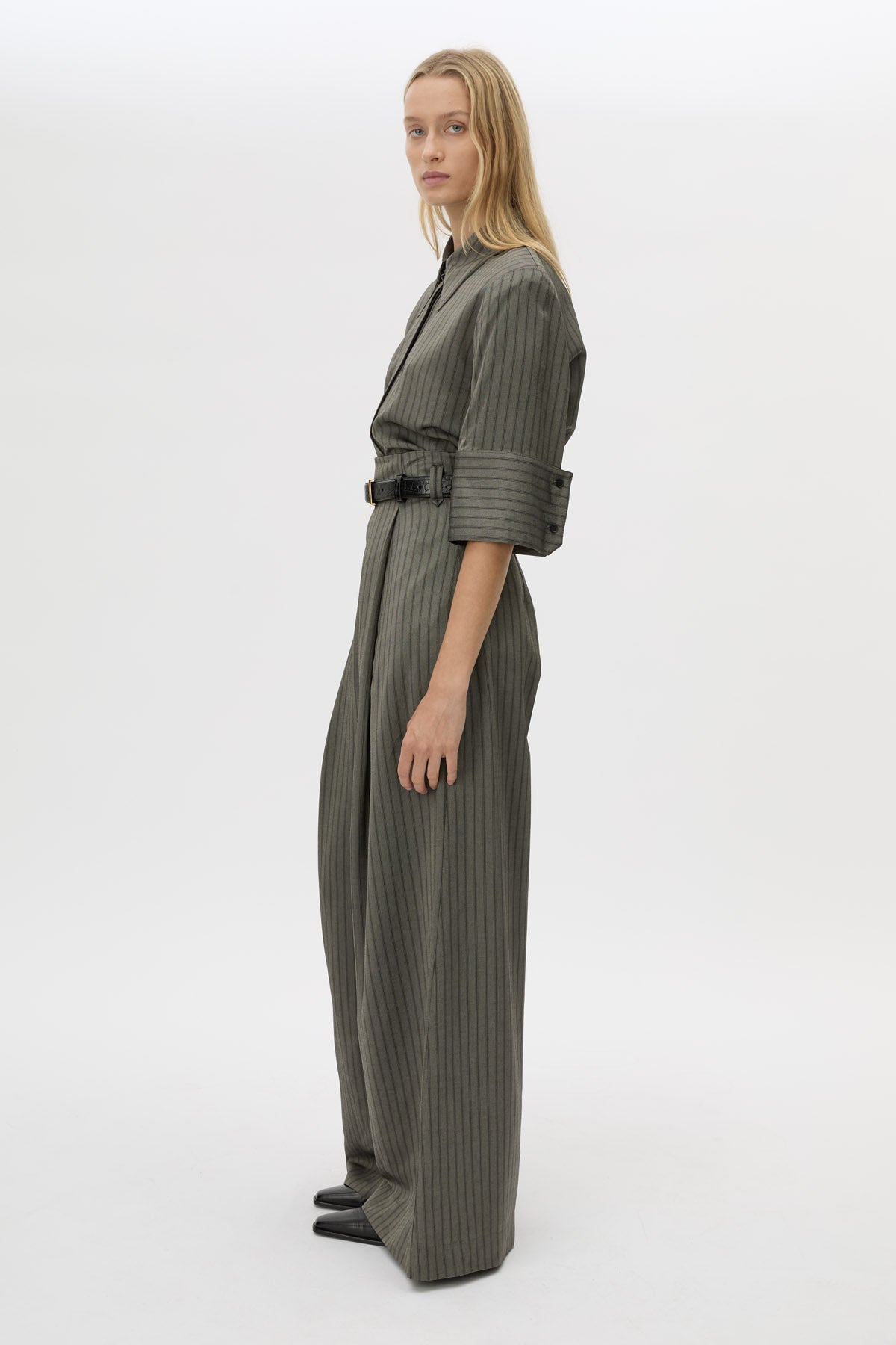 Side view CAMILLA AND MARC Mina wide-leg, high-waisted stripe pant with corseted waist.