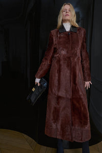 Styled view CAMILLA AND MARC Rina Coat in Chocolate Brown calf hair with contrast leather collar.