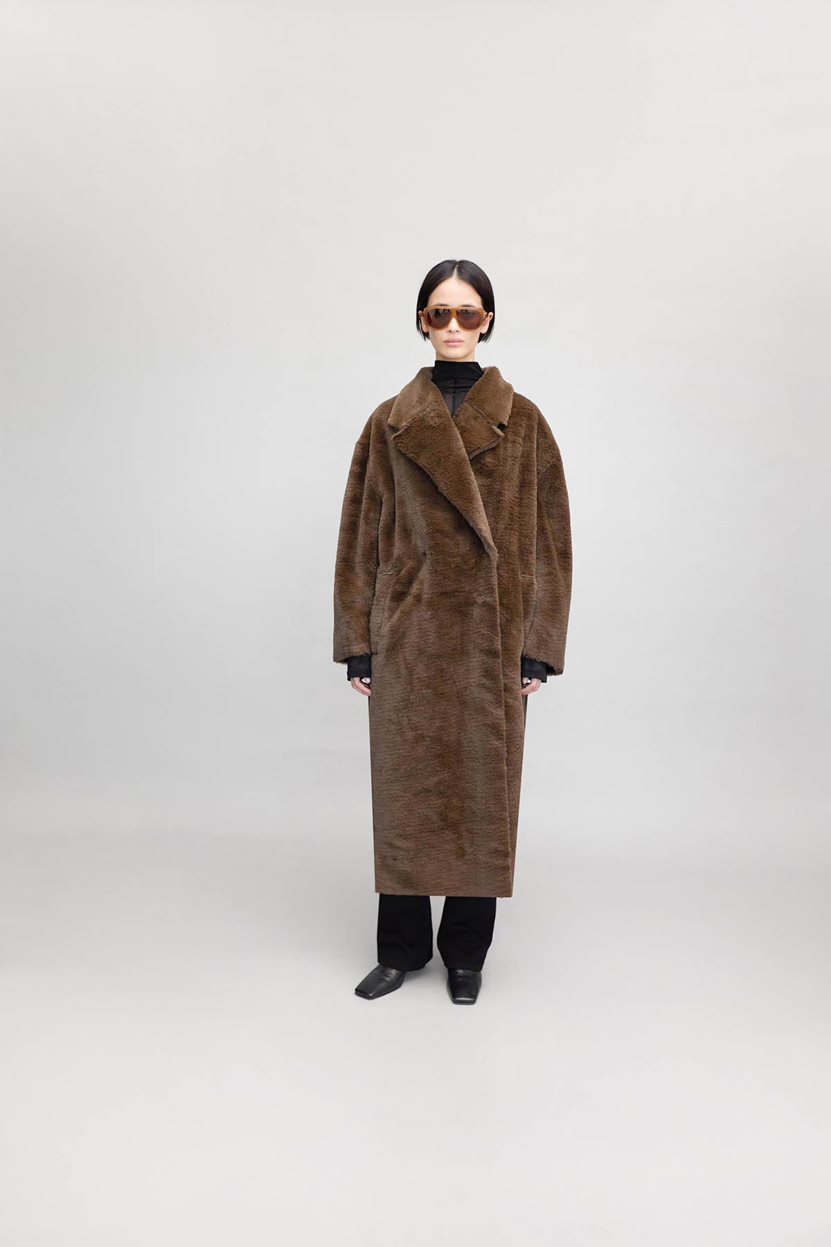 Front styled view CAMILLA AND MARC Nala Furry Coat in Truffle.