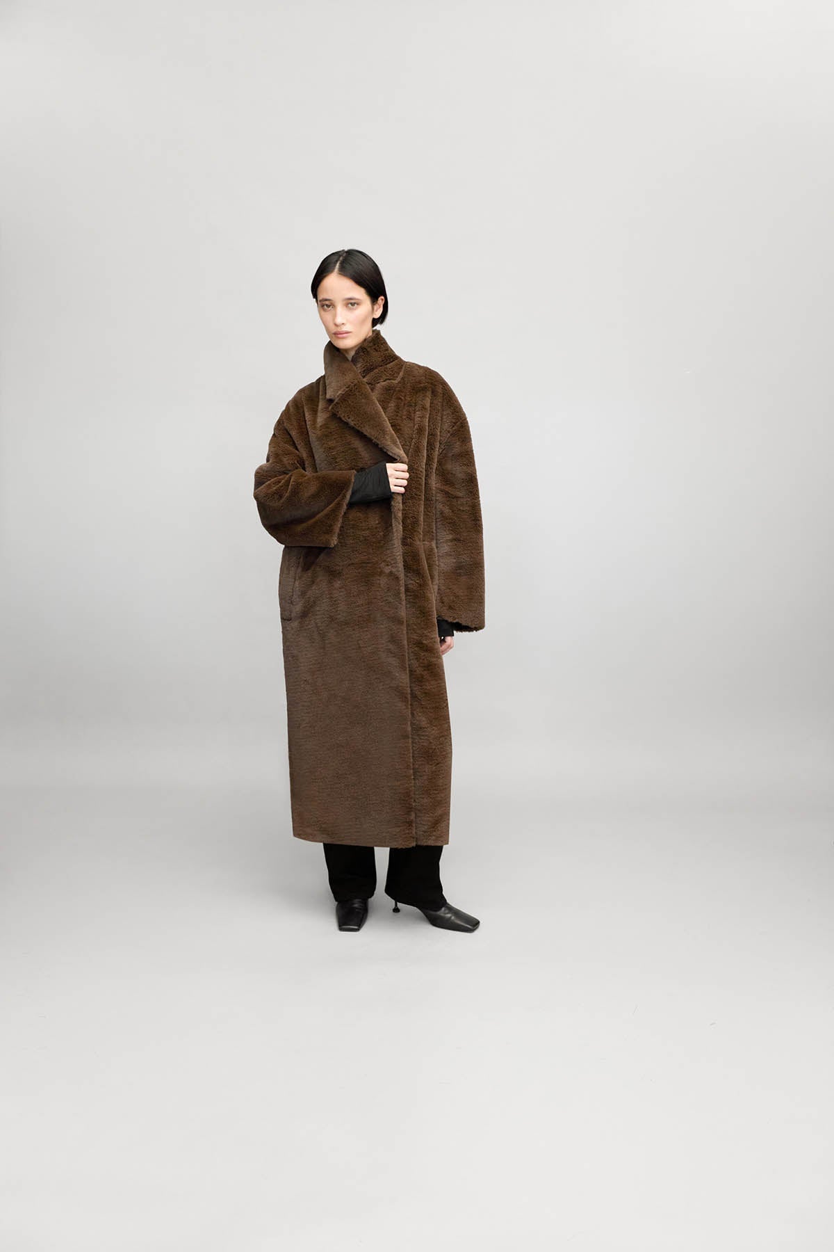 Front view CAMILLA AND MARC Nala Furry Coat in Truffle styled with the Hudson Mid Boot.