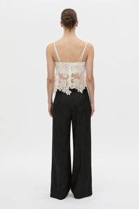 Back view CAMILLA AND MARC sheer Alvar Lace Cami in cream with adjustable elastic straps.