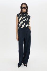 Front styled view CAMILLA AND MARC Asper Top in Navy print with sleeveless shell silhouette and high neckline.