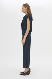 Side view CAMILLA AND MARC Audry Midi Dress in French Navy with draped sleeveless silhouette.