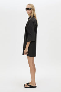 Side View CAMILLA AND MARC Avant collared black shirt dress with front symmetric pleat details. 
