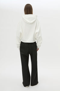 Back view CAMILLA AND MARC Carmont Graphic Hoodie in Soft White with boxy fit and black graphic logo.