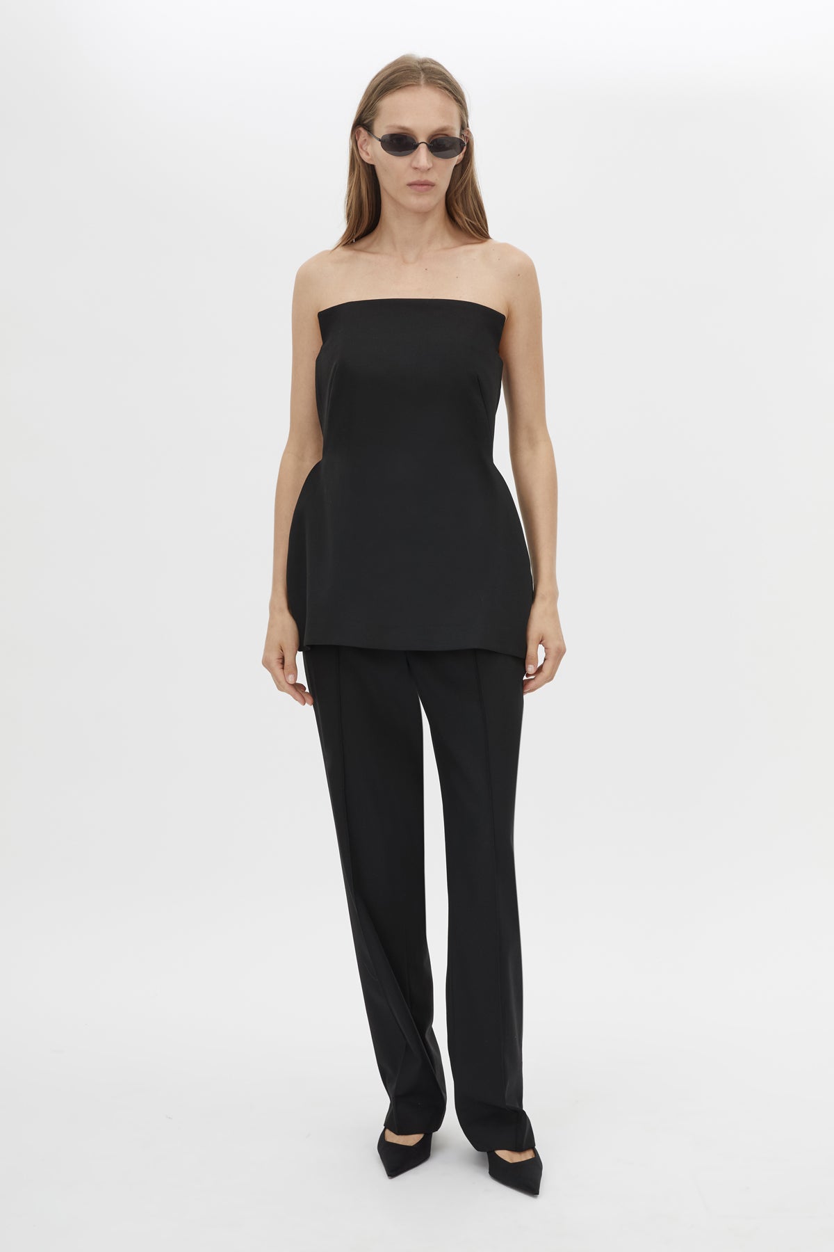 Front styled view CAMILLA AND MARC Cassie Bodice Top in Black with a tailored strapless silhouette.