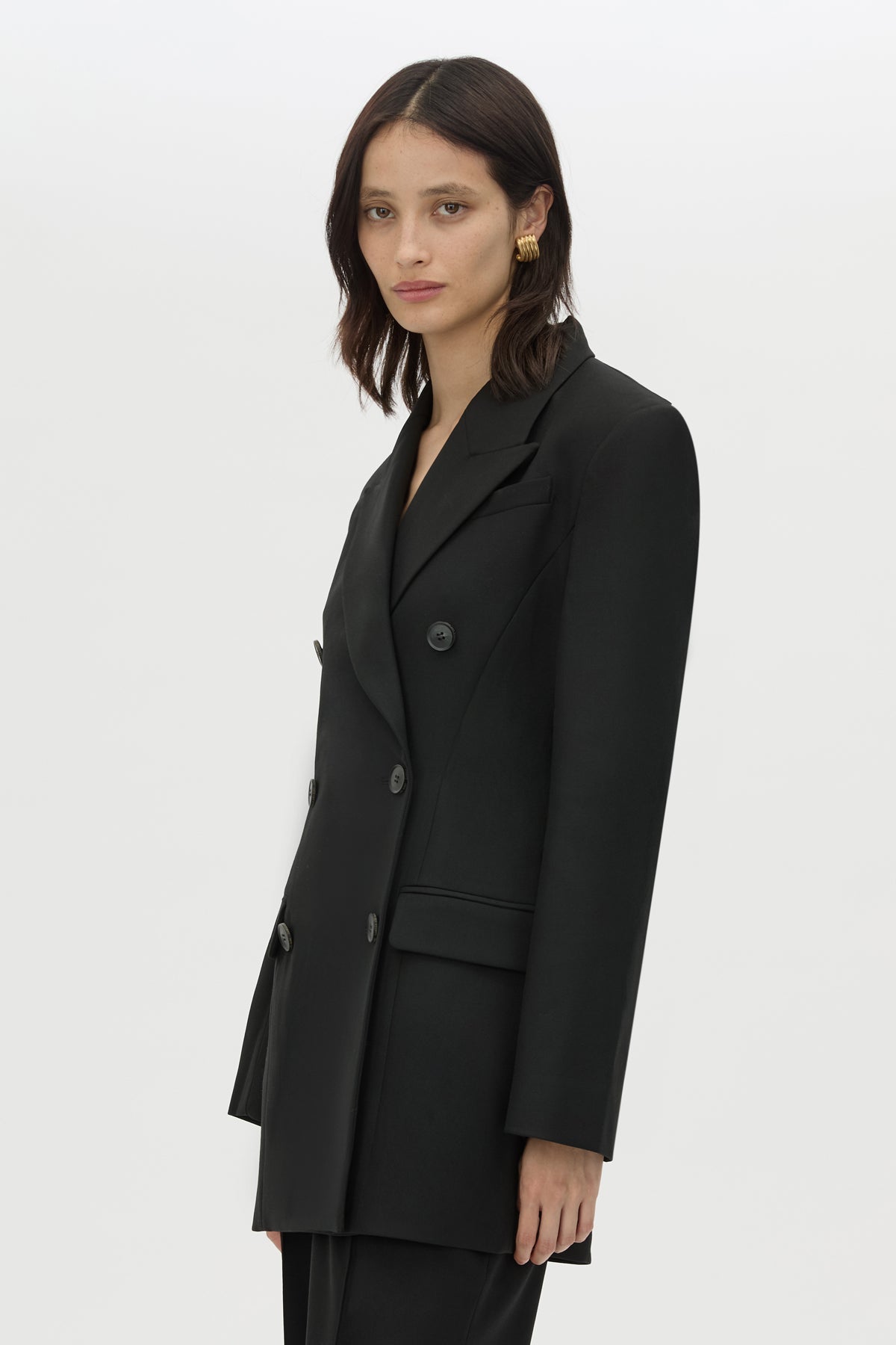 Cropped view CAMILLA AND MARC Cassie long sleeve mini dress in black with open back removable chain detail.