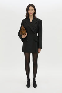 Front view CAMILLA AND MARC Cassie long sleeve mini dress in black with open back removable chain detail.
