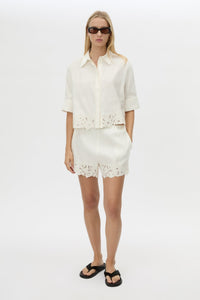 Front styled view CAMILLA AND MARC Chara Embroidered Short in Cream with embroidered hem, and elastic waistband.