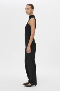 Side view CAMILLA AND MARC Chiaro Slim-Fit Pant in black with low‑waisted, tailored waistband.
