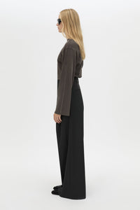 Side view CAMILLA AND MARC Dakota long sleeve relaxed top in charcoal grey with crew neckline and semi-sheer fabrication.