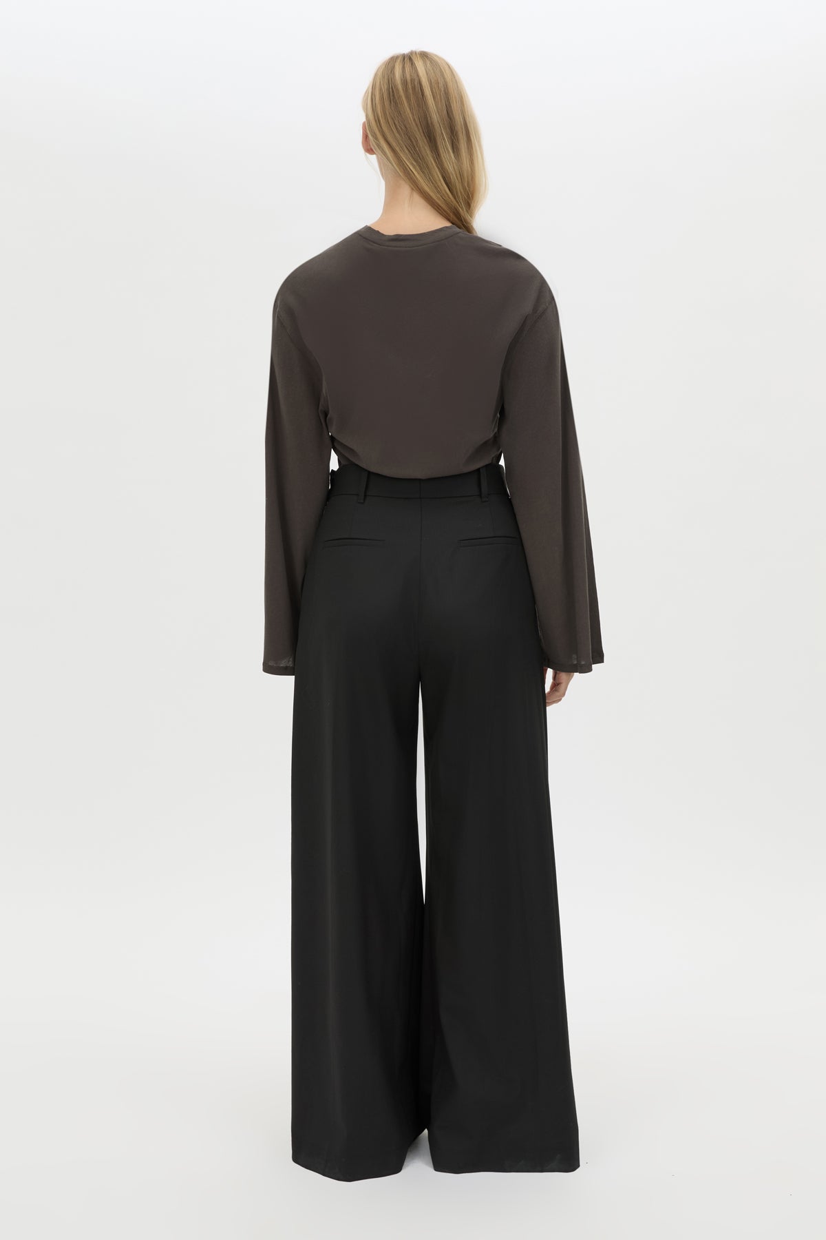 Back view CAMILLA AND MARC Dakota long sleeve relaxed top in charcoal grey with crew neckline and semi-sheer fabrication.