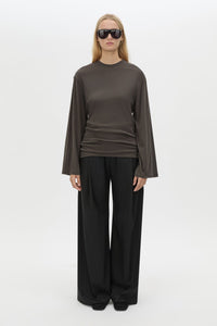 Styled view CAMILLA AND MARC Dakota long sleeve relaxed top in charcoal grey with crew neckline and semi-sheer fabrication