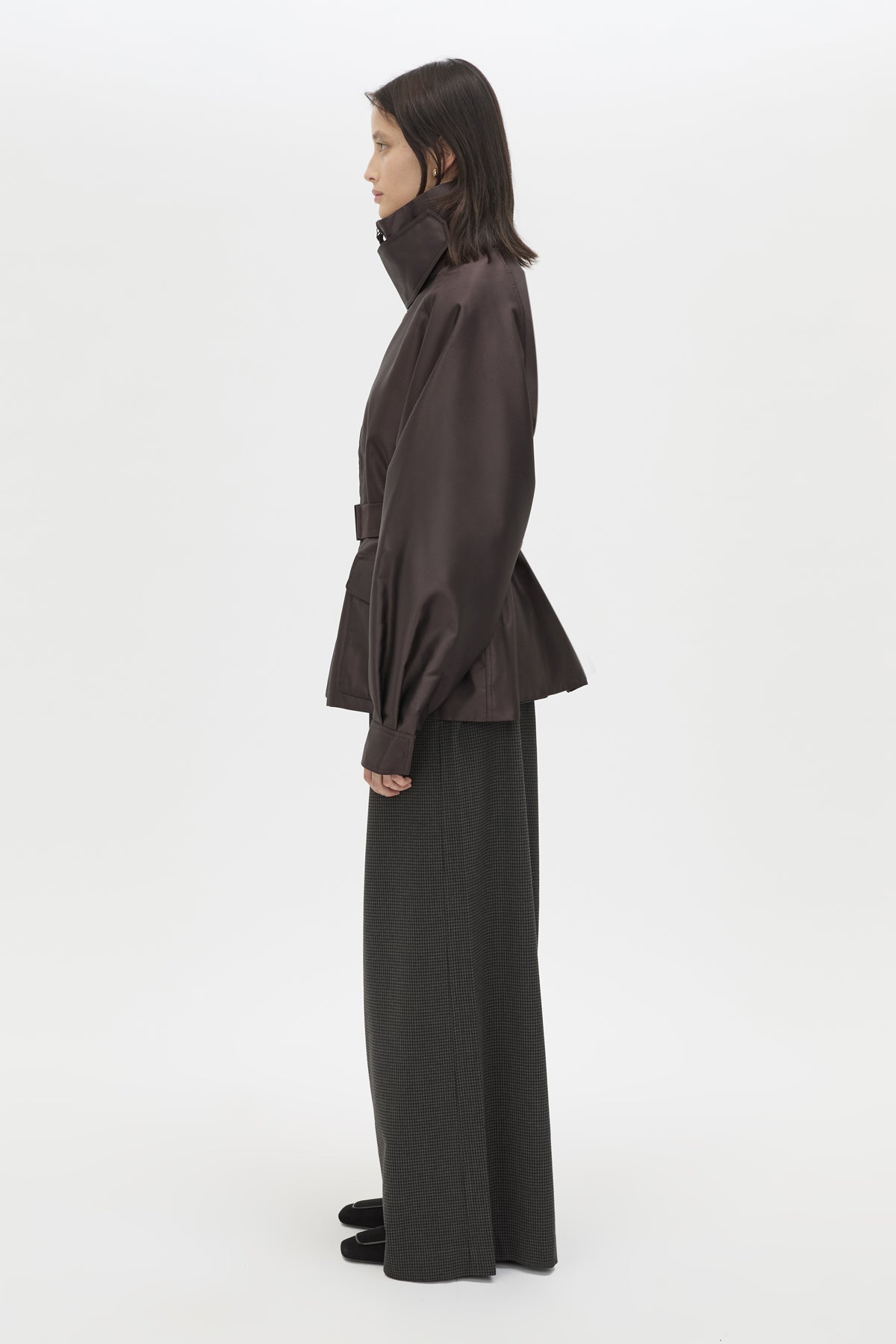 Side view CAMILLA AND MARC Drea Puffer Jacket in Espresso Brown with funnel neck and padded puffer silhouette.