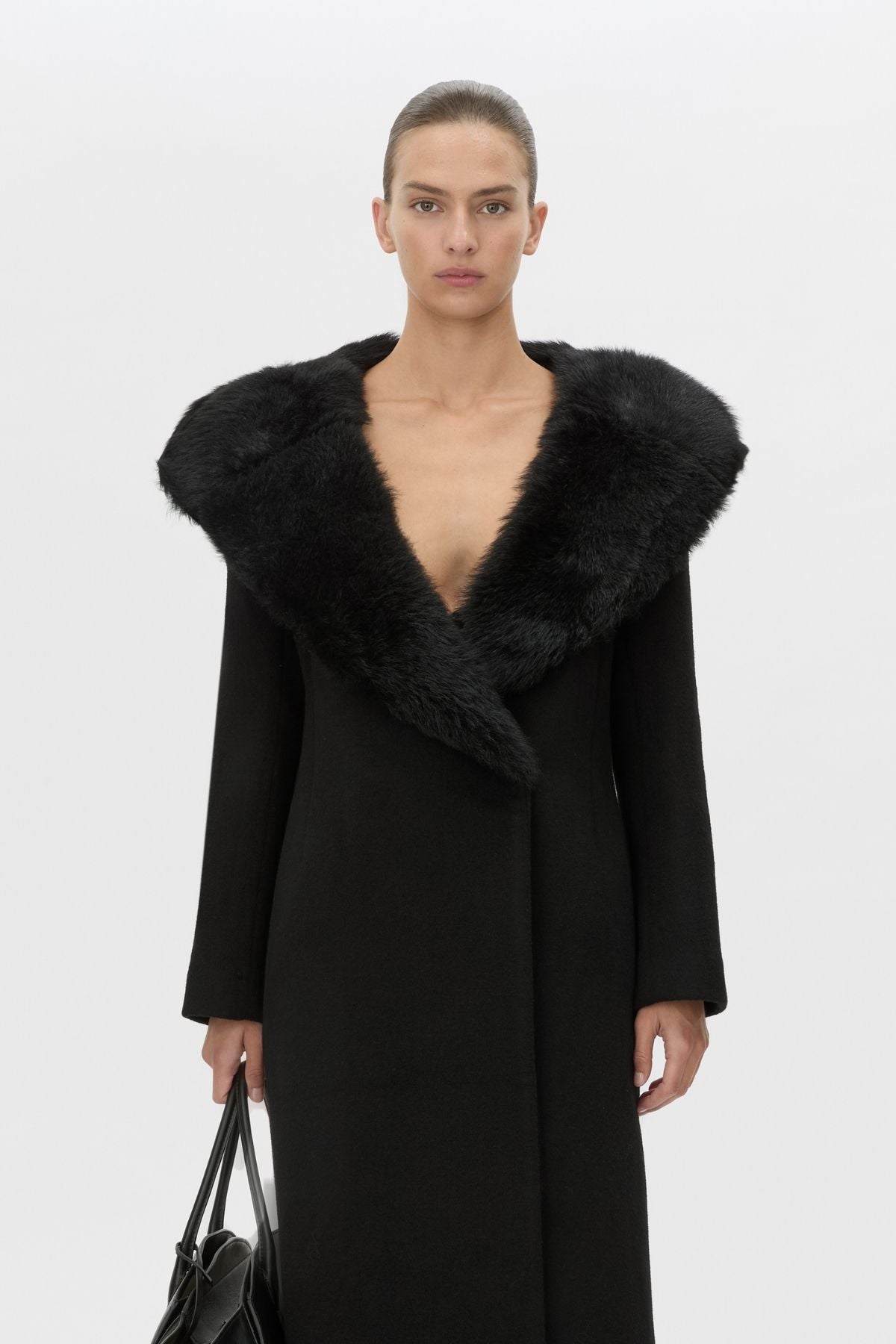 Cropped view CAMILLA AND MARC Elira Double-Breasted Coat in black with contrast Toscana shearling collar.