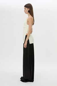 Side view CAMILLA AND MARC Elise Top in Cream with sculpted fit, off‑shoulder design and side hem splits.