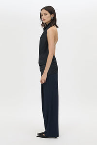 Side view CAMILLA AND MARC Elowyn Halter Top in French Navy with a draped open back and asymmetric hem.