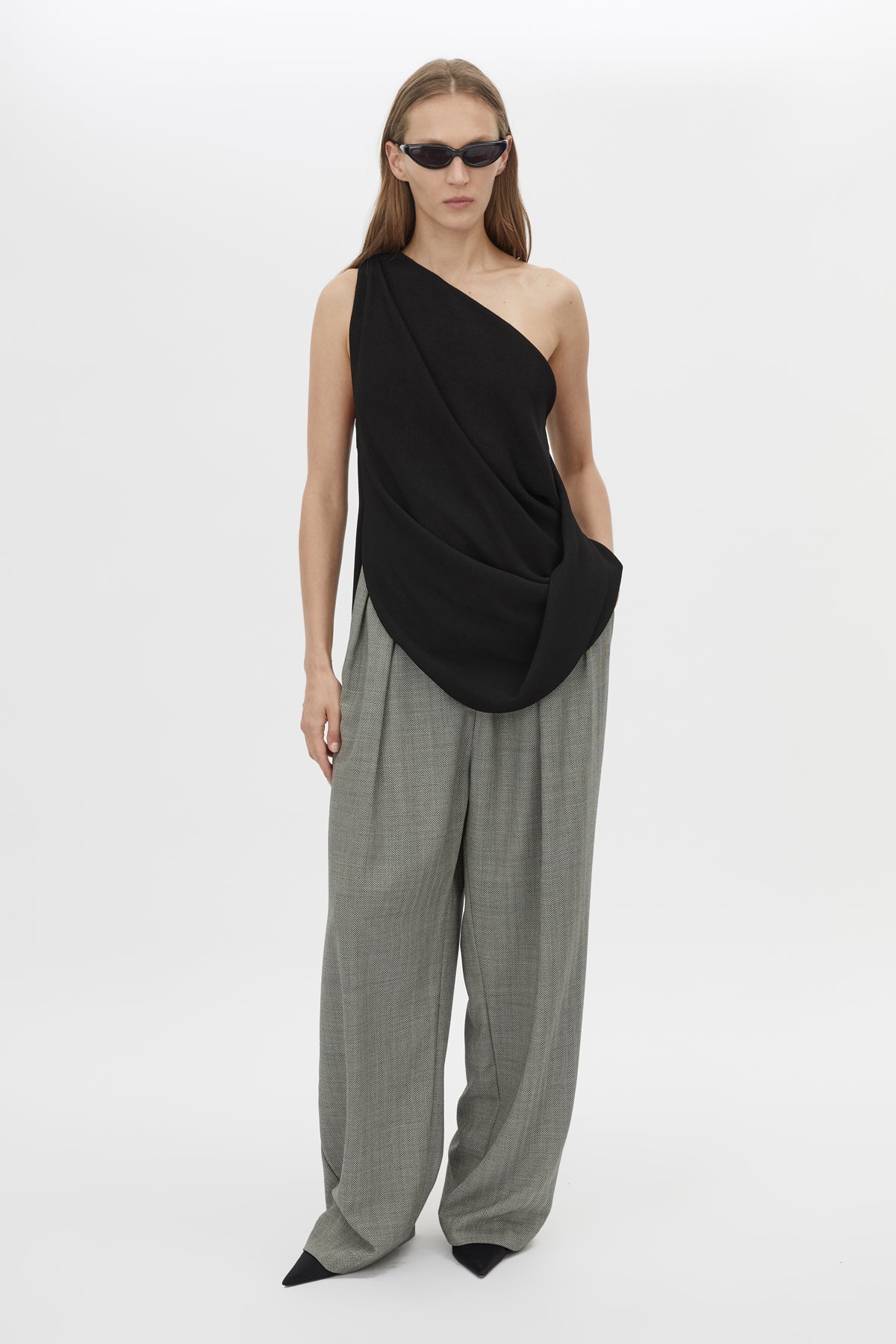 Front view CAMILLA AND MARC Eon Top in Black with a draped asymmetric silhouette.
