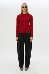 Front view CAMILLA AND MARC Esme Knit Sweater in Cherry Red styled with the Tala Barrel Leg Pant.