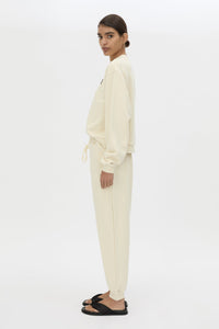 Side view CAMILLA AND MARC Idris Track Pant in Ecru with relaxed fit.