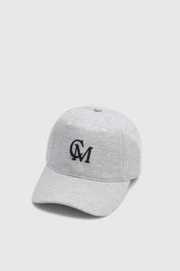 Three-quarter view CAMILLA AND MARC Isolde Embroidered Logo Cap in Grey Marle and black with front embroidered artwork.