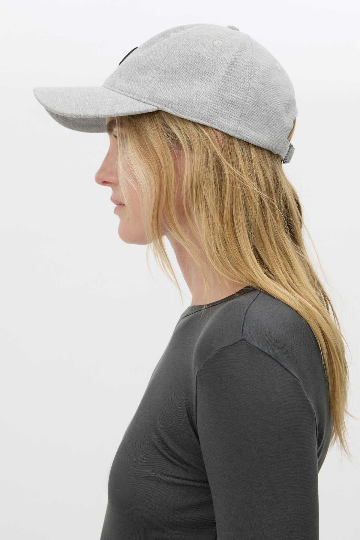 Side  view CAMILLA AND MARC Isolde Embroidered Logo Cap in Grey Marle and black with front embroidered artwork.
