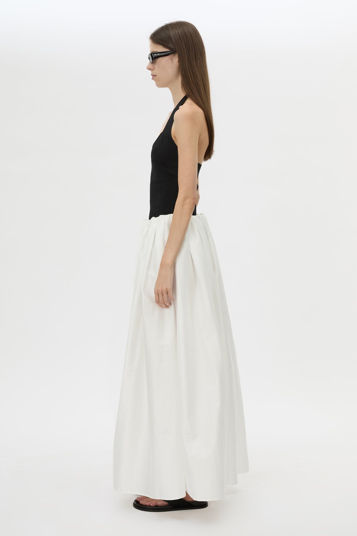 Side view CAMILLA AND MARC Juliet Knit Halter Top in Black with ribbed halter neckline.