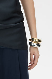 Front styled view CAMILLA AND MARC Koa Cuff in sculptural 18k gold plating.  