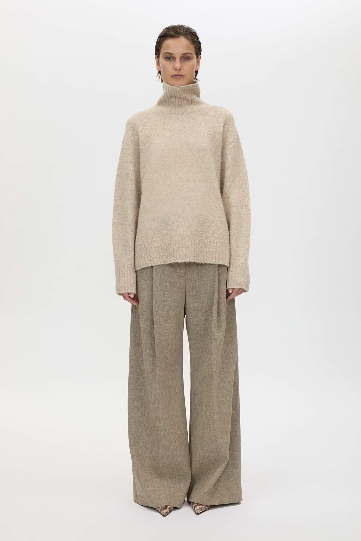 Front view CAMILLA AND MARC Leonie Turtleneck Knit Sweater in Oatmeal Marle styled with the Halden Pant.