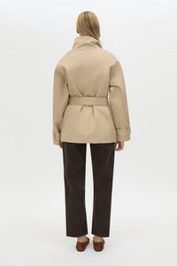 Back view CAMILLA AND MARC Mahdavi Puffer Jacket in Tan with boxy silhouette and double‑breasted design.