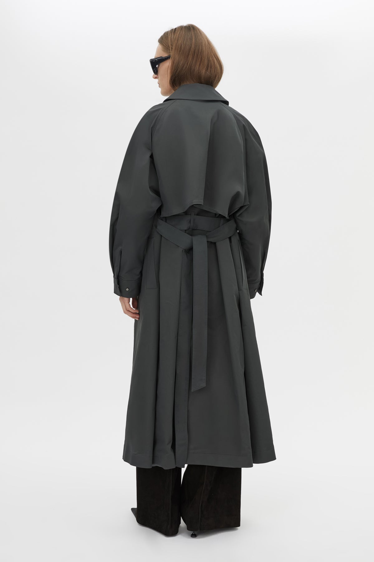 Back view CAMILLA AND MARC Mahdavi Trench in Grey with oversized silhouette and dropped raglan long sleeves.
