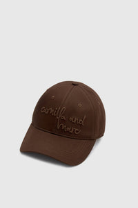 Three-quarter view CAMILLA AND MARC Maren Embroidered Cap in Chocolate Brown with front embroidered artwork.