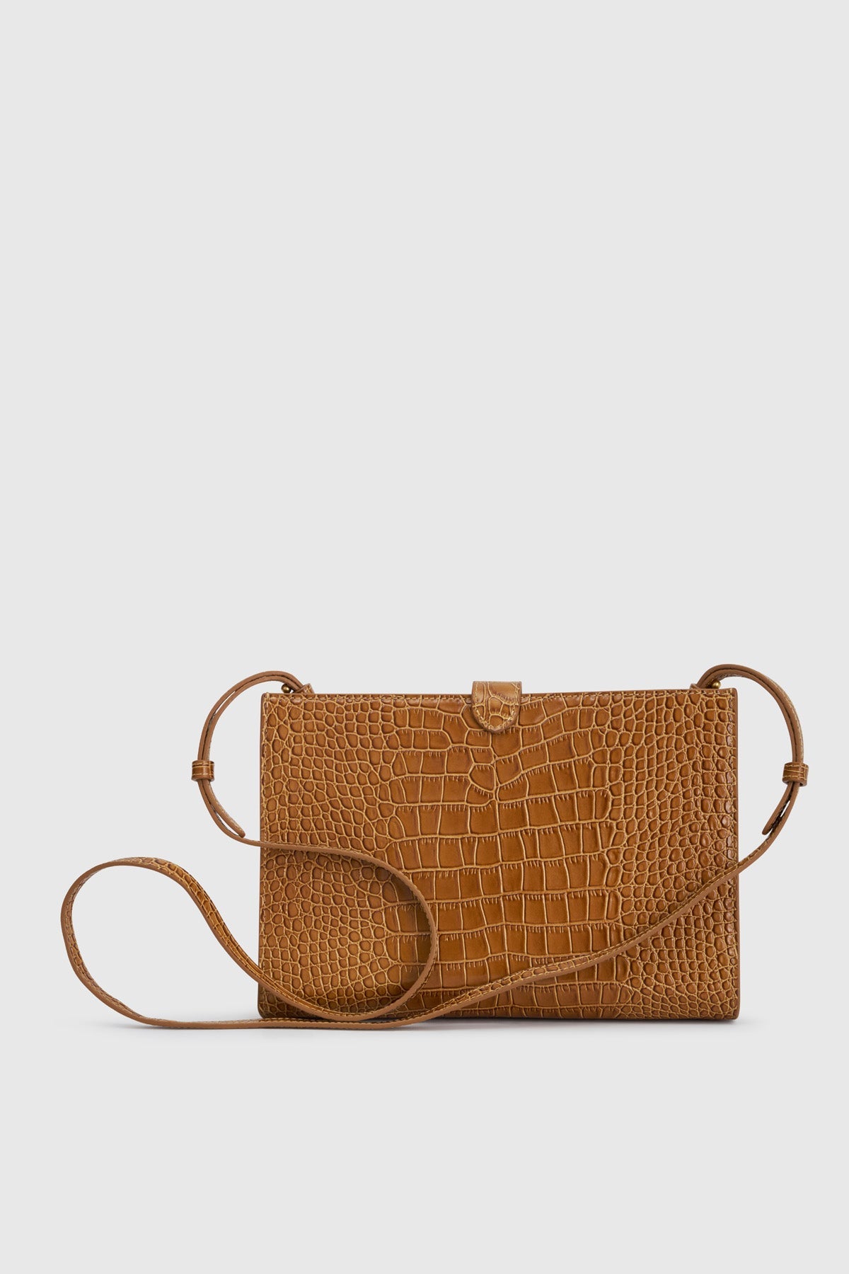 Back view CAMILLA AND MARC Mette Croc Clutch in tan croc‑embossed leather.