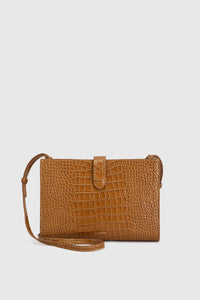 Ghost view CAMILLA AND MARC Mette Croc Clutch in tan croc‑embossed leather.
