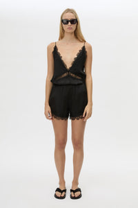 Front styled view CAMILLA AND MARC Mirage Lace Trim Short in Black, featuring a satin fabrication, and elastic waistband.