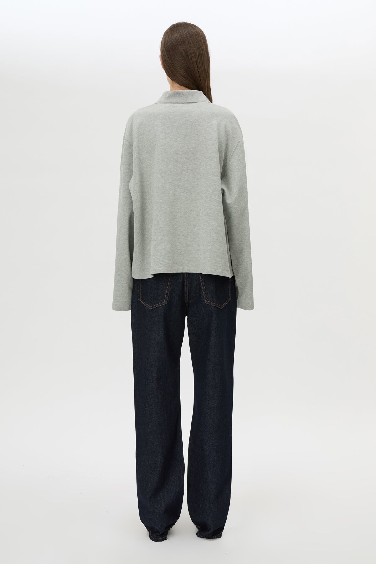 Back view CAMILLA AND MARC Moreno Long Sleeve Polo Top in Grey Marle with quarter button placket, and embroidered monogram.