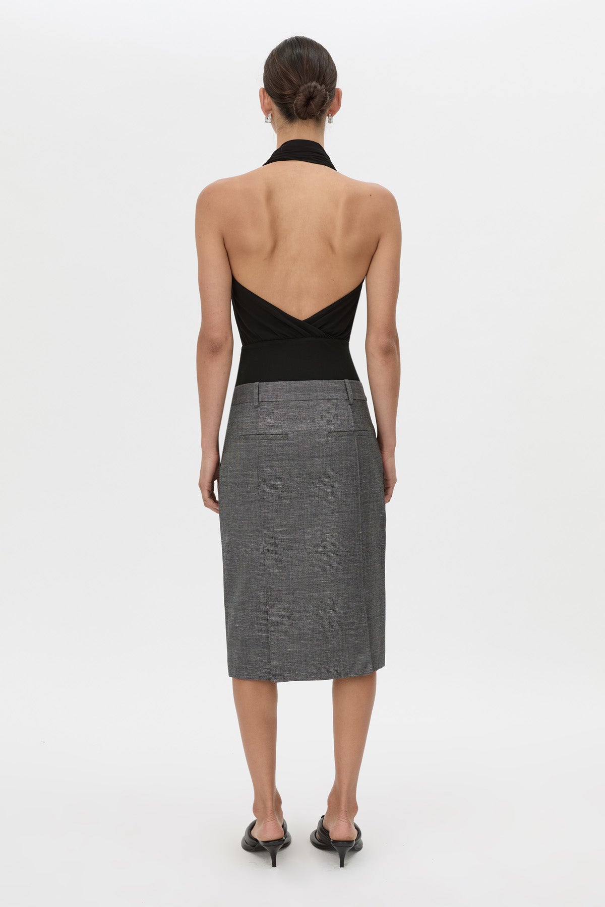 Back view CAMILLA AND MARC Myro Bodysuit in black with a knotted wrap cowl neckline.