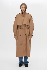 Front Styled View CAMILLA AND MARC Nelle trench coat in toffee twill fabrication with an oversized fit.