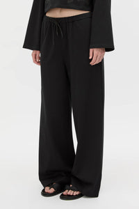 Cropped view CAMILLA AND MARC Niami Jersey Pant in black with a relaxed straight‑leg fit.