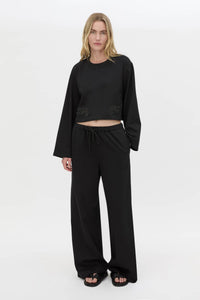 Front-styled view CAMILLA AND MARC Niami Jersey Pant in black with a relaxed straight‑leg fit.