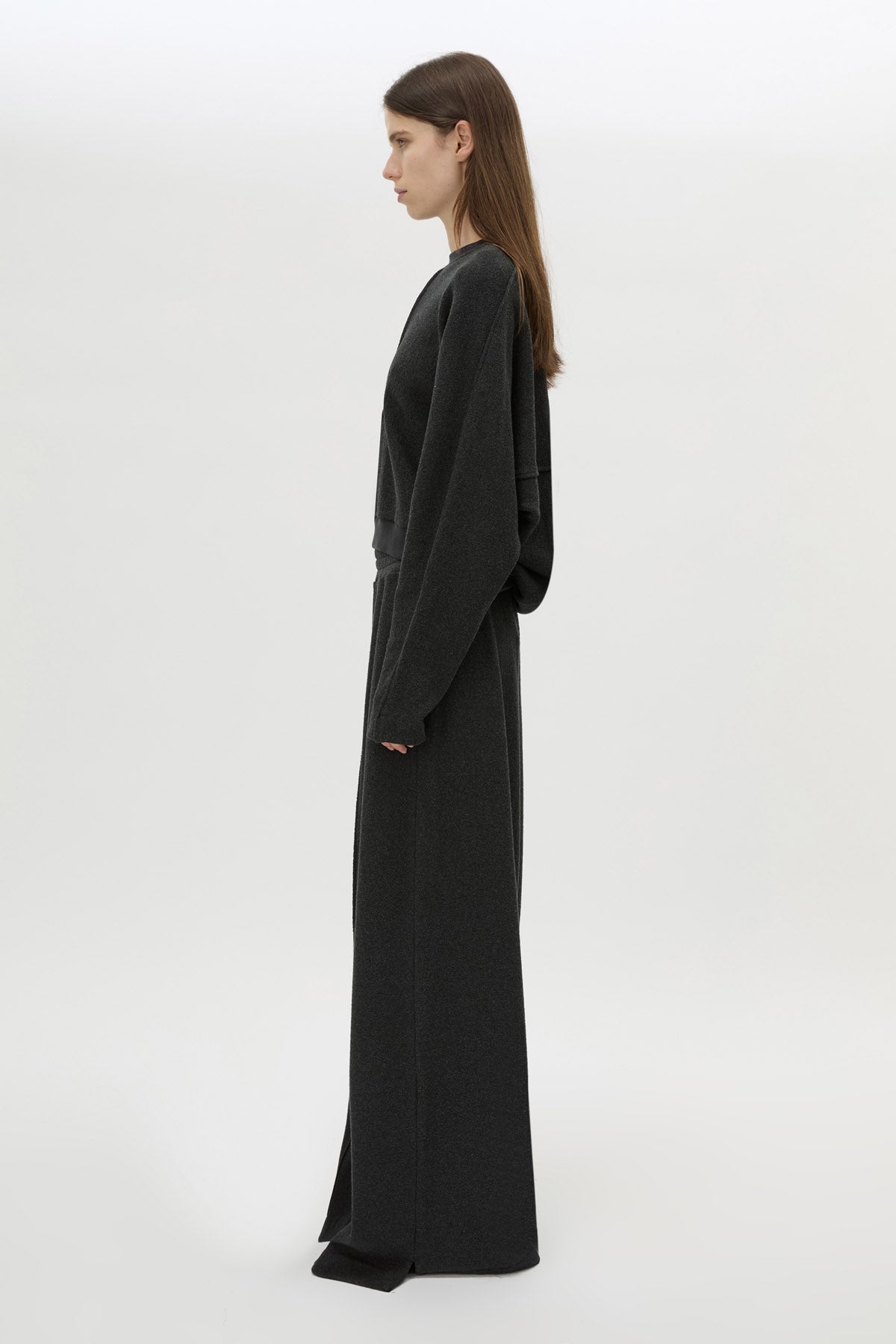 Side View CAMILLA AND MARC Pace Track Pant in charcoal grey with elasticated waist and wide-leg.