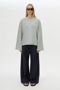 Front view CAMILLA AND MARC Peretti Long Sleeve Tee in Grey Marle styled with the Brody Pant.