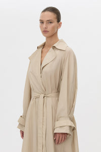 Cropped view CAMILLA AND MARC Pietro Full Length Sheer Trench in stone with raglan sleeves.