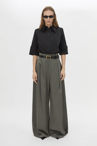 Front view CAMILLA AND MARC Pique Short Sleeve Shirt in Black with a boxy silhouette and French‑cuff sleeves.