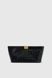 Front ghost view CAMILLA AND MARC Poppy Eel Clutch in Black eel‑embossed leather with ribbed gold hardware.