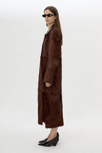 Side view CAMILLA AND MARC Rina Coat in Chocolate Brown calf hair with contrast leather collar.