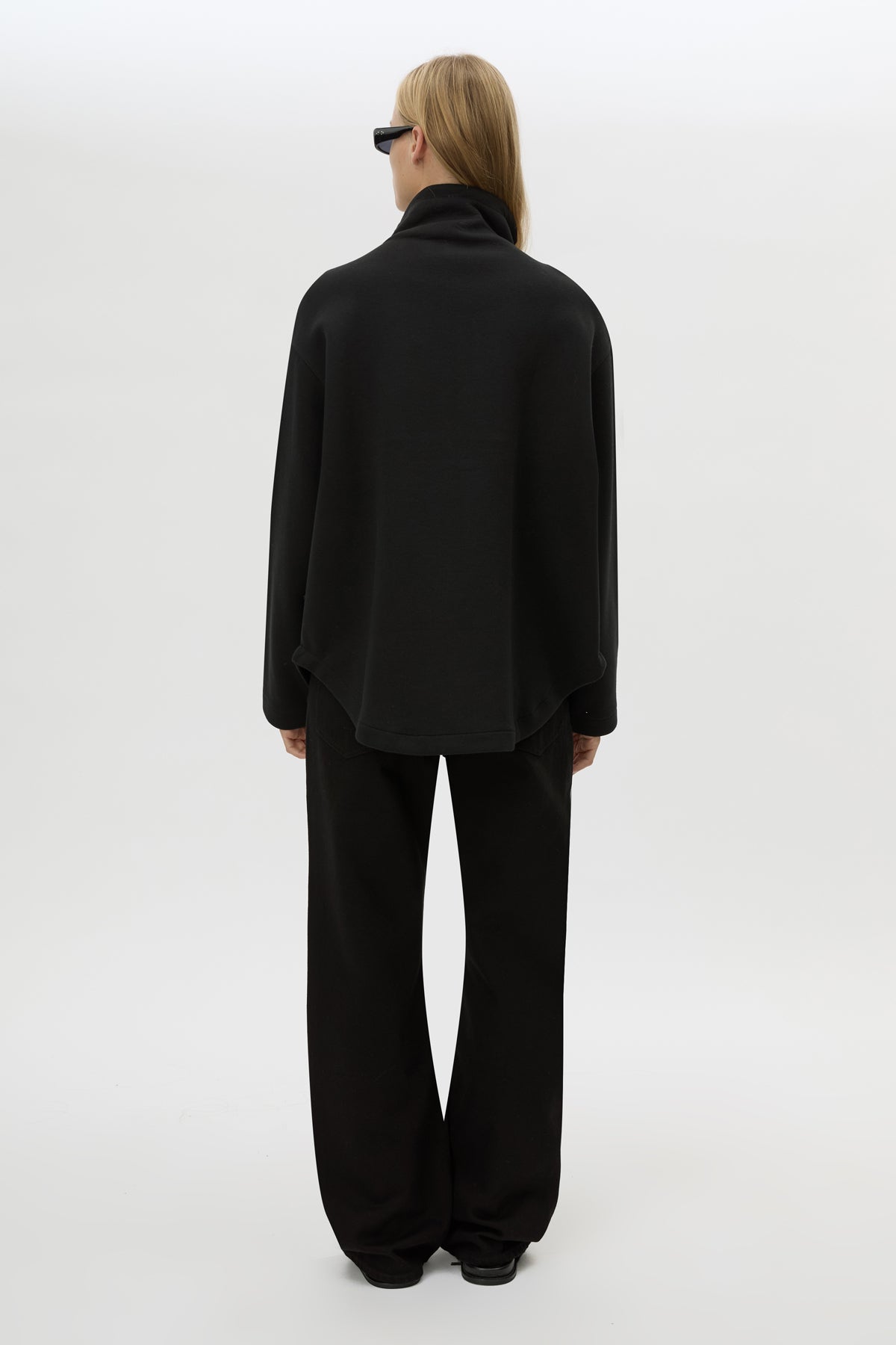 Back view CAMILLA AND MARC Salem Bonded Fleece Jacket in black with high collared neckline.