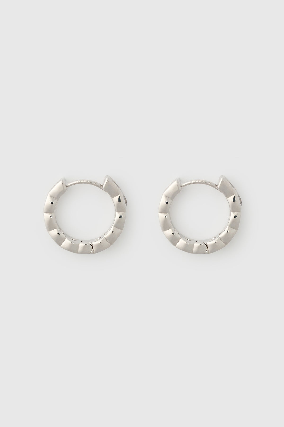 Side view CAMILLA AND MARC Sloane Huggies in Silver rhodium plating.