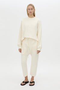 Front view CAMILLA AND MARC Studio cropped mid-rise track pant in winter white with elasticated waistband. 